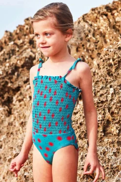 Bañador smock de soles azul claro