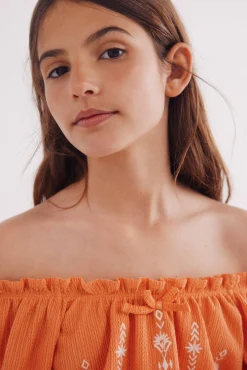 Blusa fruncida para niña