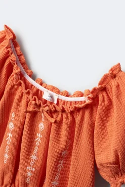 Blusa fruncida para niña