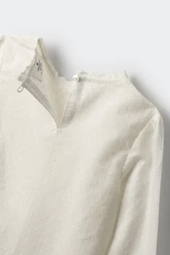 Blusa plumetti niña