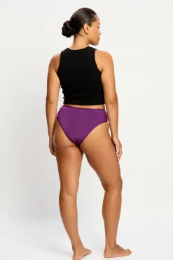 Braga menstrual clásica morado