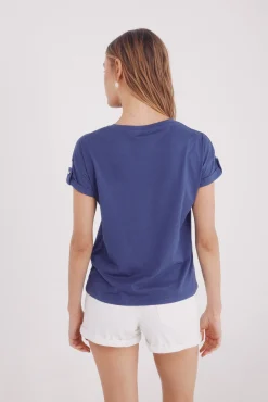 Camiseta gráfica manga botón