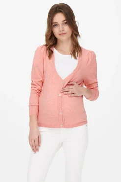 Chaqueta de punto premamá color rosa claro.