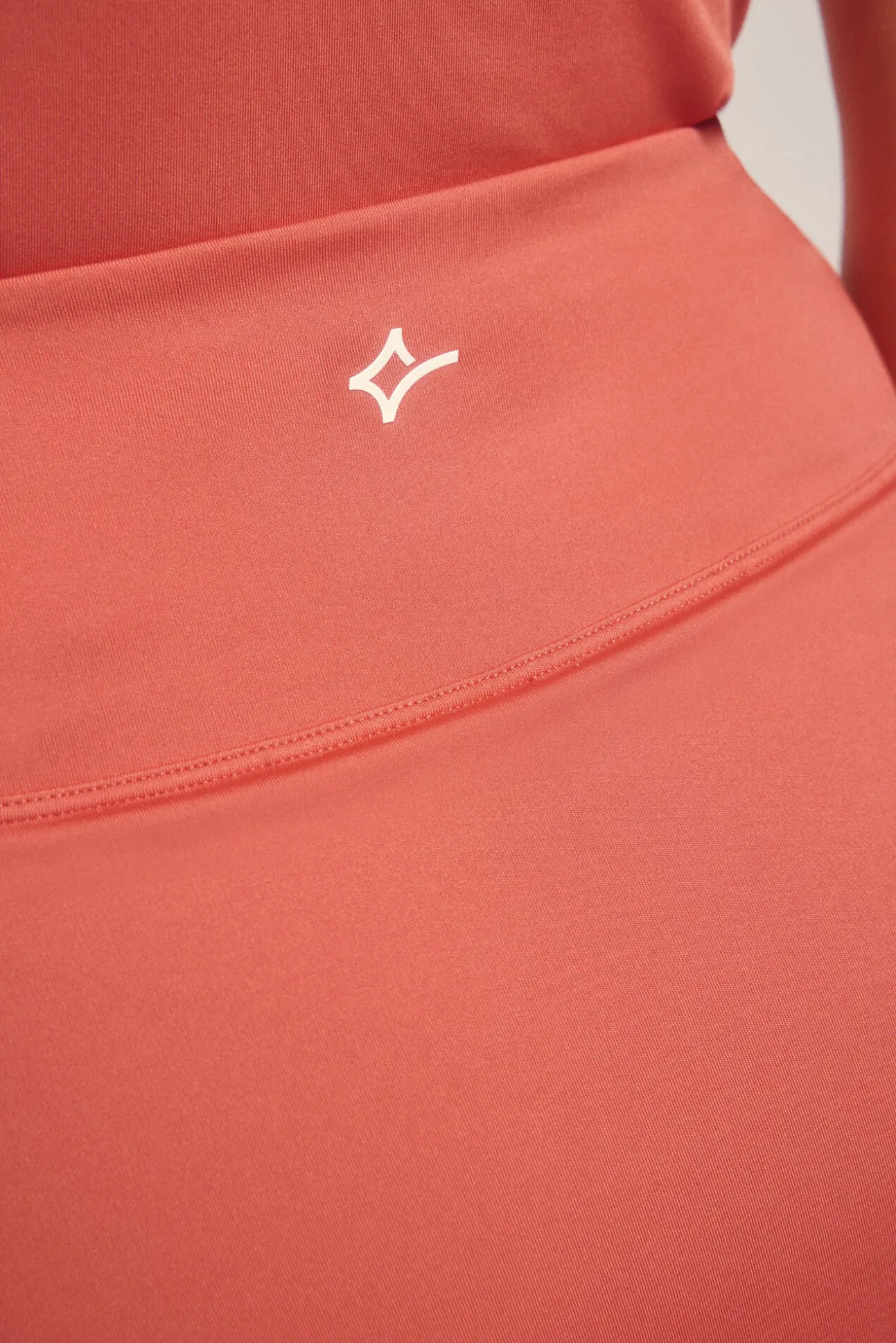 Falda malla interior coral