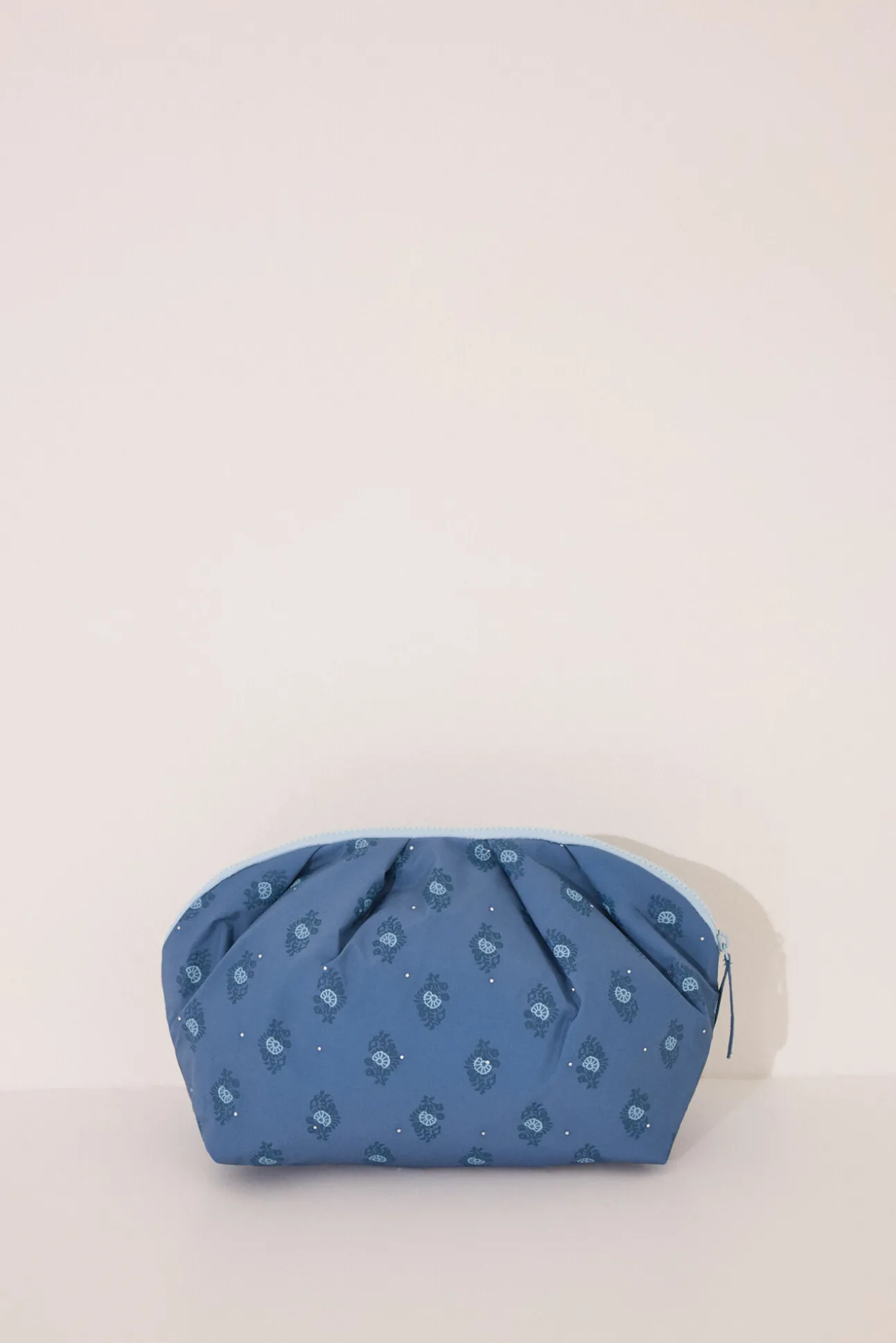 Neceser grande acolchado estampado azul