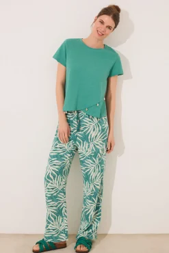 Pantalón largo estampado hojas verde