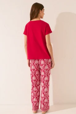 Pantalón largo viscosa estampado hojas rojo