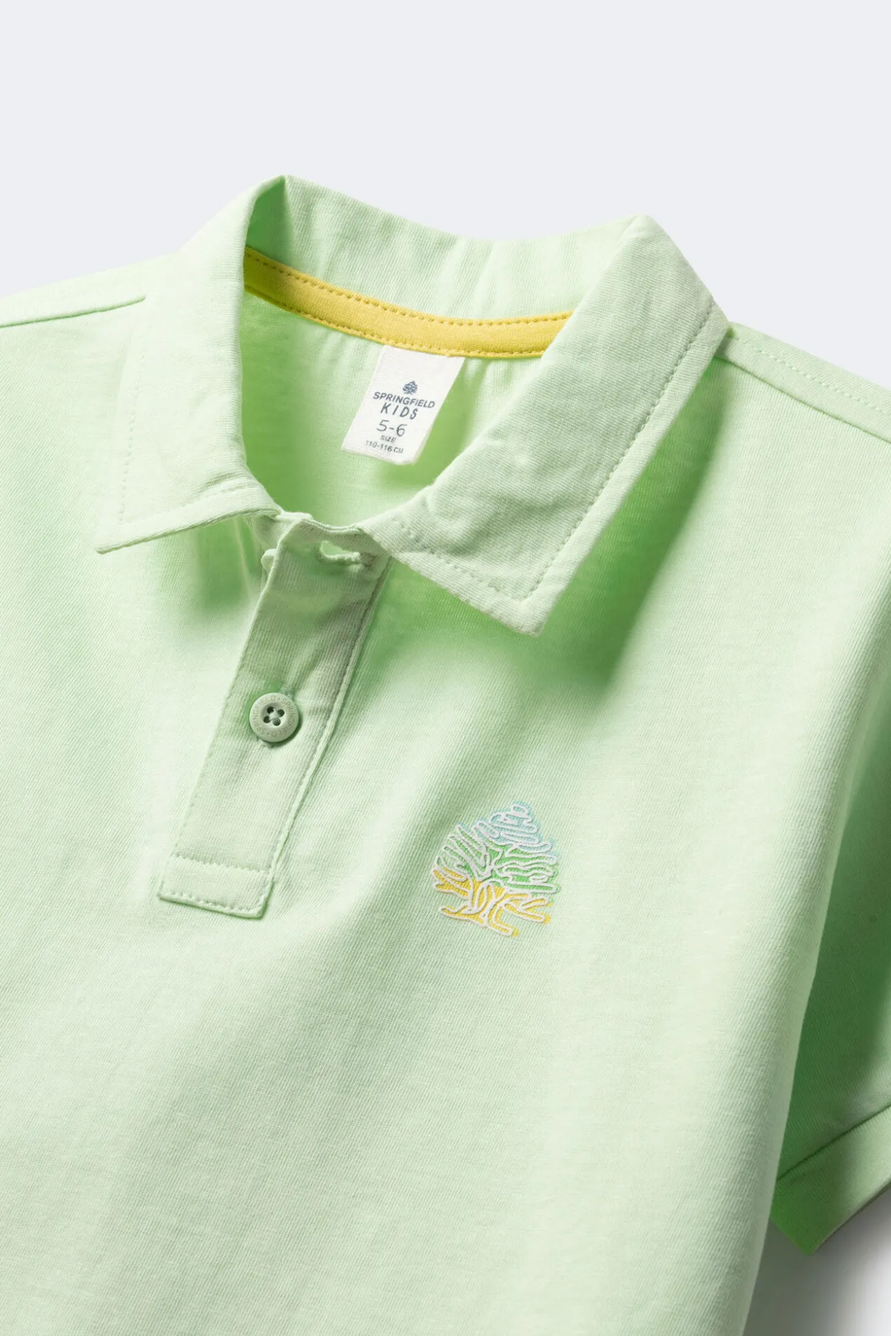 Polo logo espalda niño