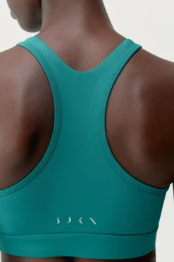 Top deportivo Bikila