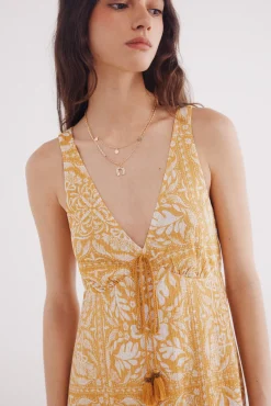 Vestido midi estampado mostaza